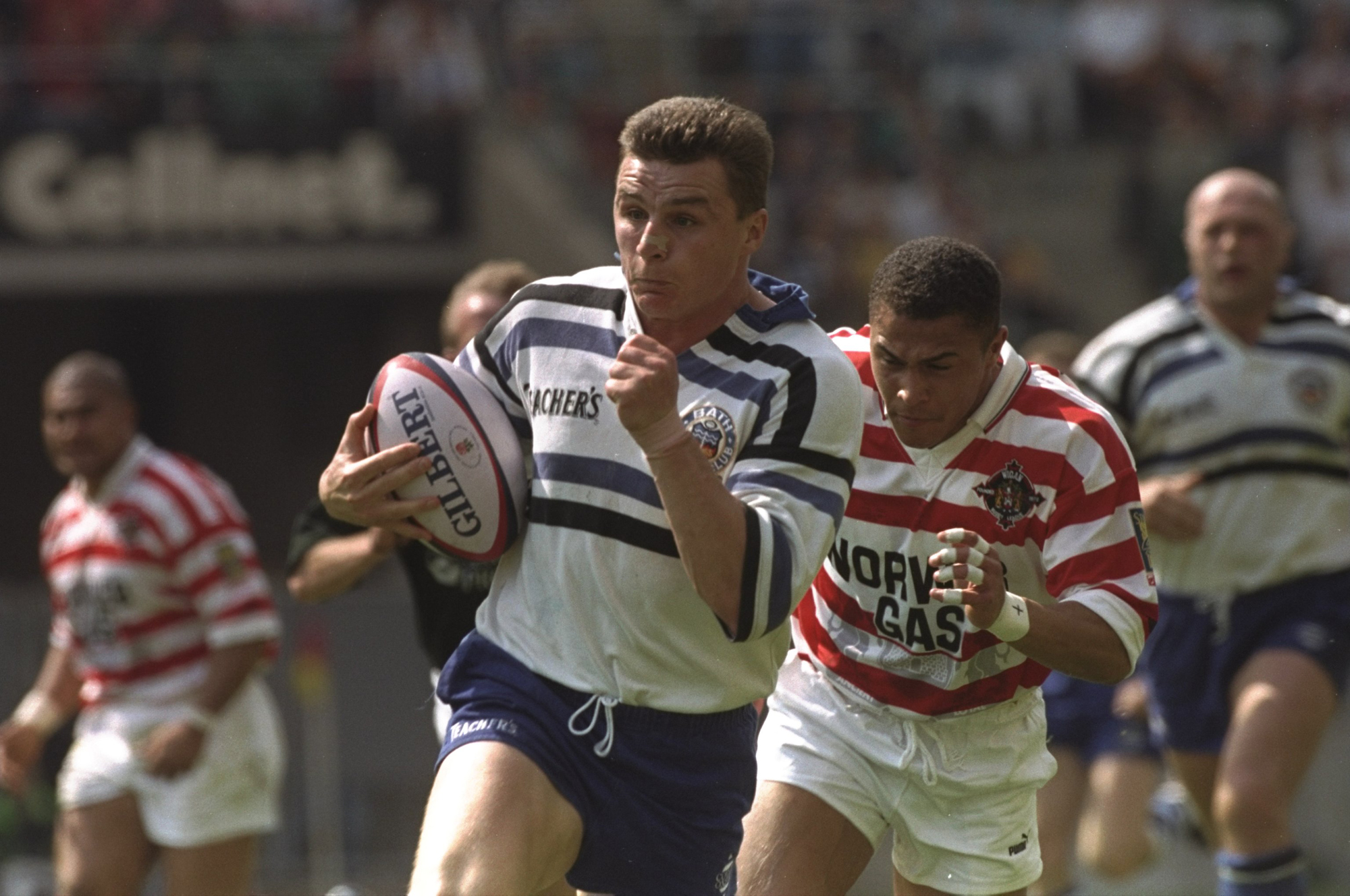Bath's Jon Sleightholme on his way to scoring a try during the union leg of the Clash of the Codes in May 1996.